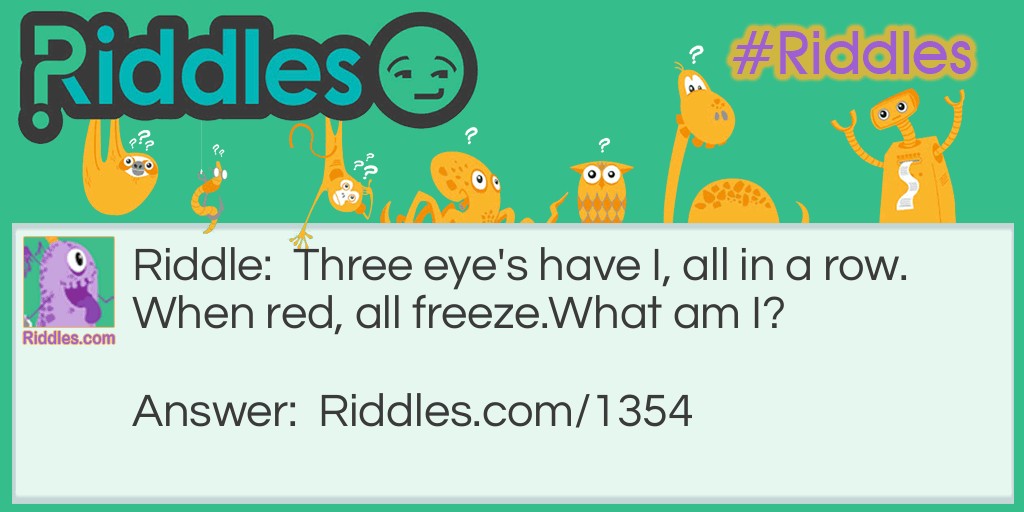 Three eye's have I, all in a row. When red, all freeze.
What am I?